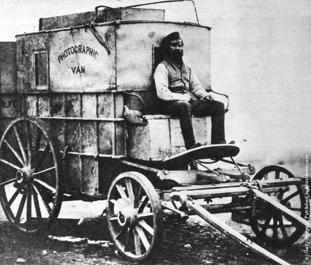 Roger Fenton's mobile darkroom during the Crimean War; his assistant, Marcus Sparling, is seated. 1850s.