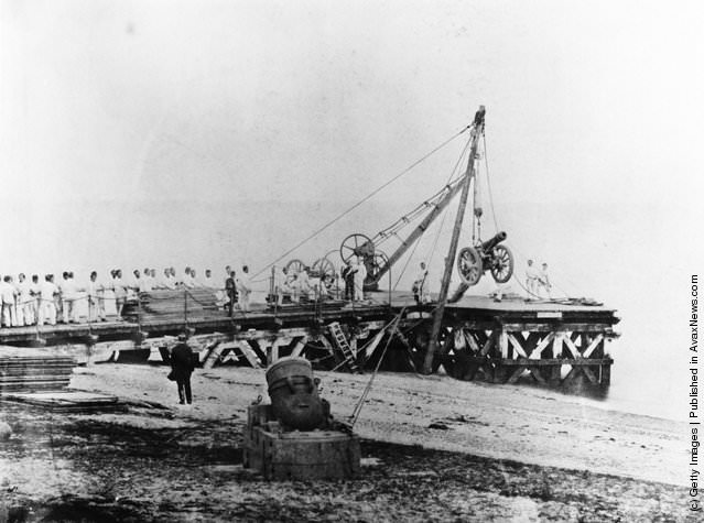 A British cannon being loaded onto a ship at Sevastopol, 1855.