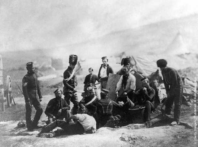 8th Hussars soldiers preparing a meal during the Crimean War, 1855.