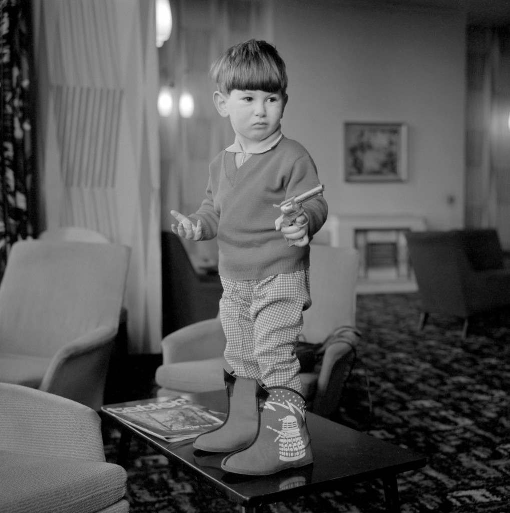 David Furman wearing slippers decorated with a Dalek motif from the BBC television program ‘Dr. Who’, 1965.