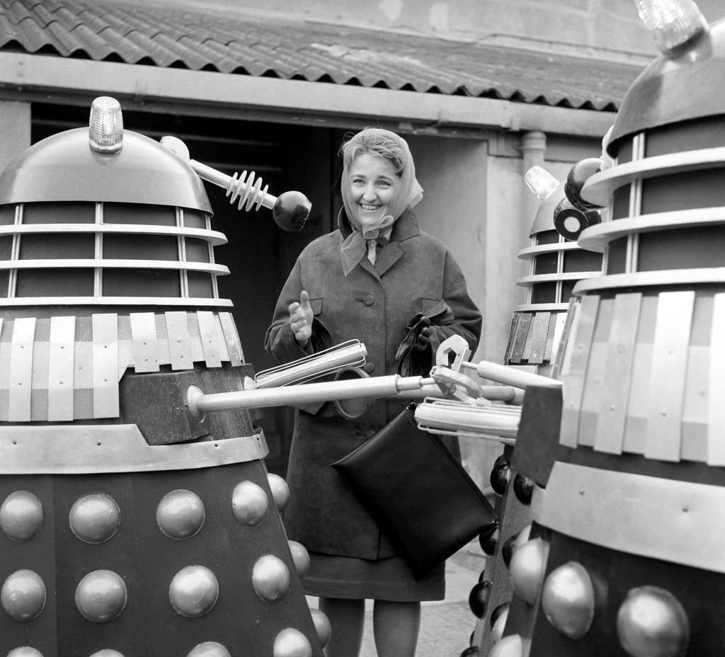 Nadezhda Volchenko surrounded by Daleks on a set at Shepperton Studios for “Daleks Invade Earth, 2150 AD, 1966.