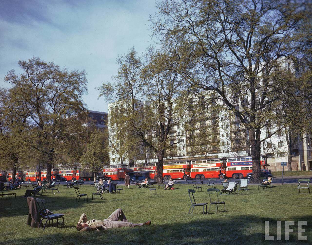 People relaxing in Hyde Park during WWII.