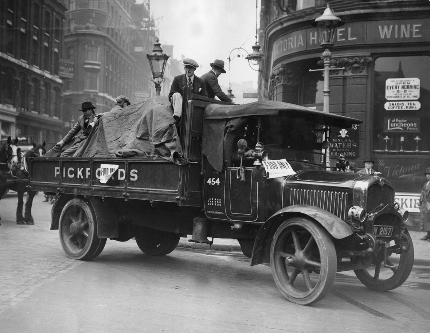 A guarded truck transports food to Smithfield Market in London.