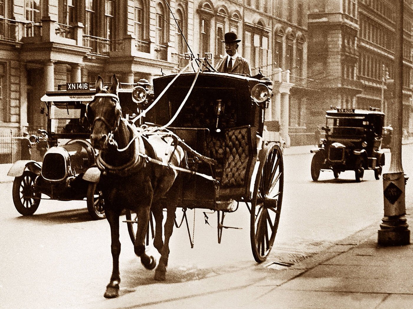 London horse cab and motor taxi, 1920s.