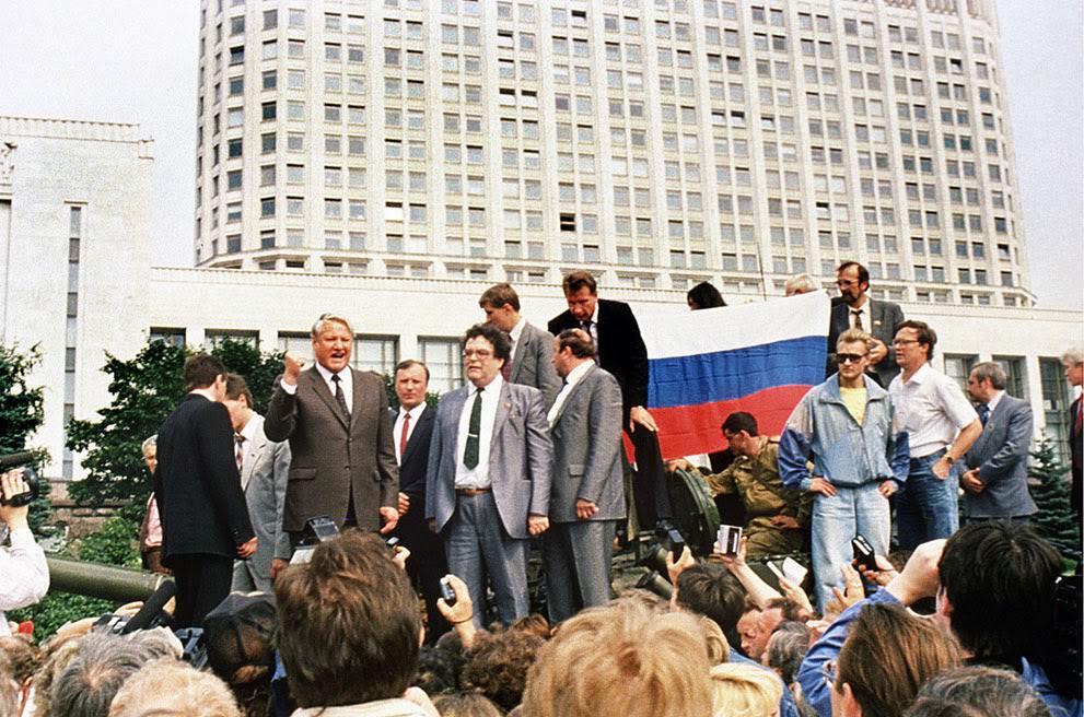 Russian President Boris Yeltsin stands on an armored vehicle during a coup attempt, 1991.