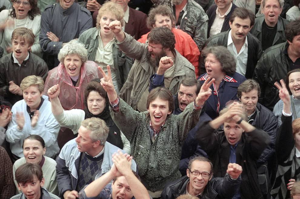 A crowd celebrates the failure of the Communist coup outside the Russian Parliament building in Moscow, 1991.