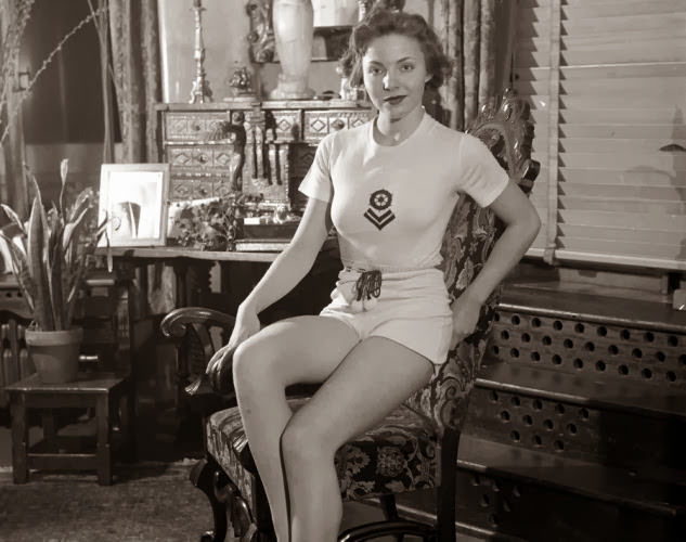Model Mardee Hoff, selected for having the most perfect figure in America at the time, poses in short shorts in 1935.