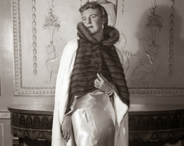 Though wearing fur today is a bit of a taboo, back in the 1930s it was extremely common. Here, a model wears a white Russian ermine cape with a sable collar in a fur fashion show at the Waldorf-Astoria Hotel, 1935.
