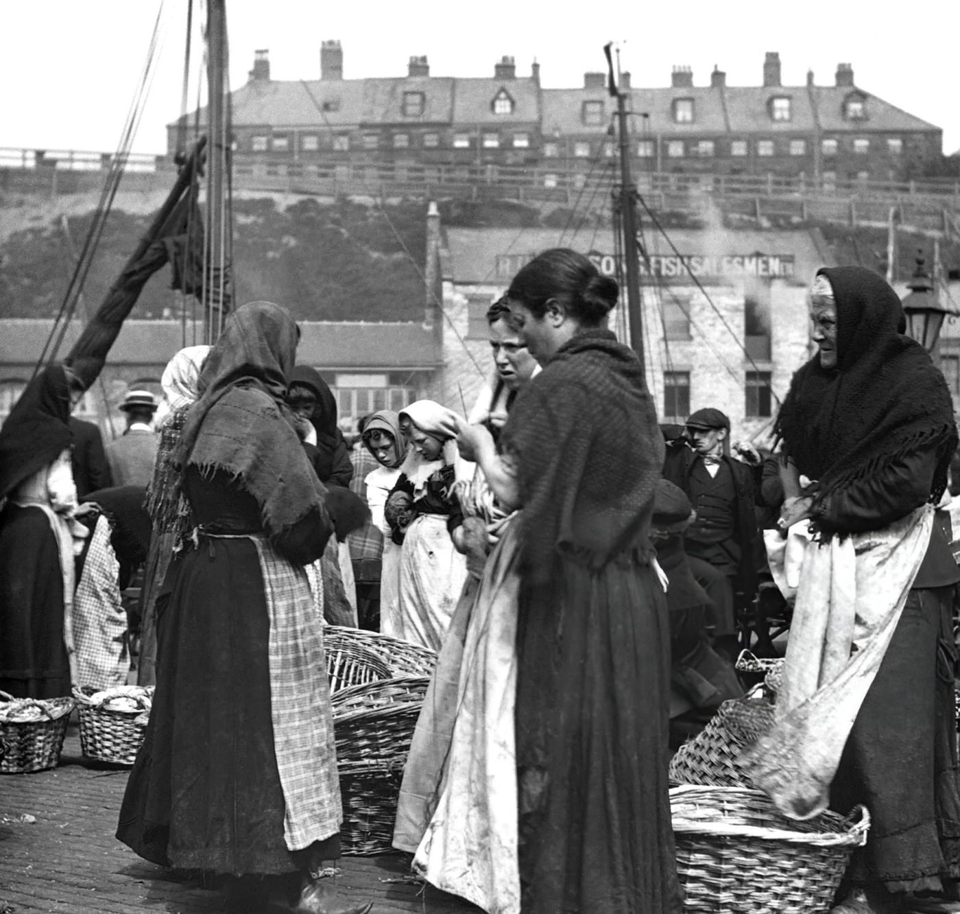 Fish women at North Shields Fish Quay with baskets of herring, North Shields, England, 1880s.