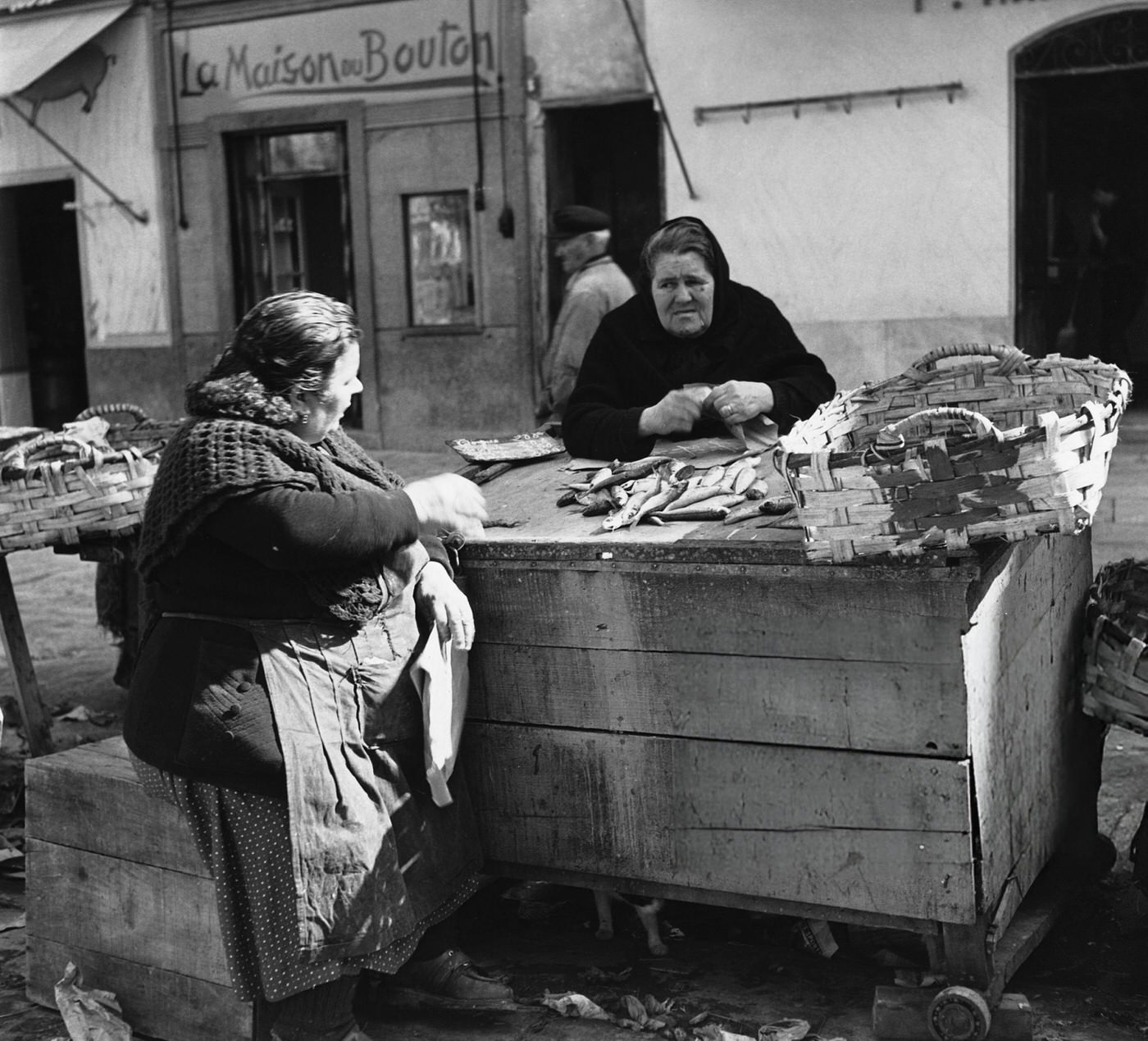 Two fisherwomen gut the remains of the night's catch in Batsia, Corsica.