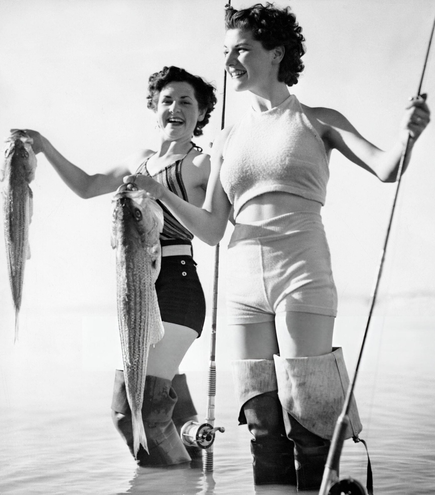 Two women ice fishing in California, 1937.