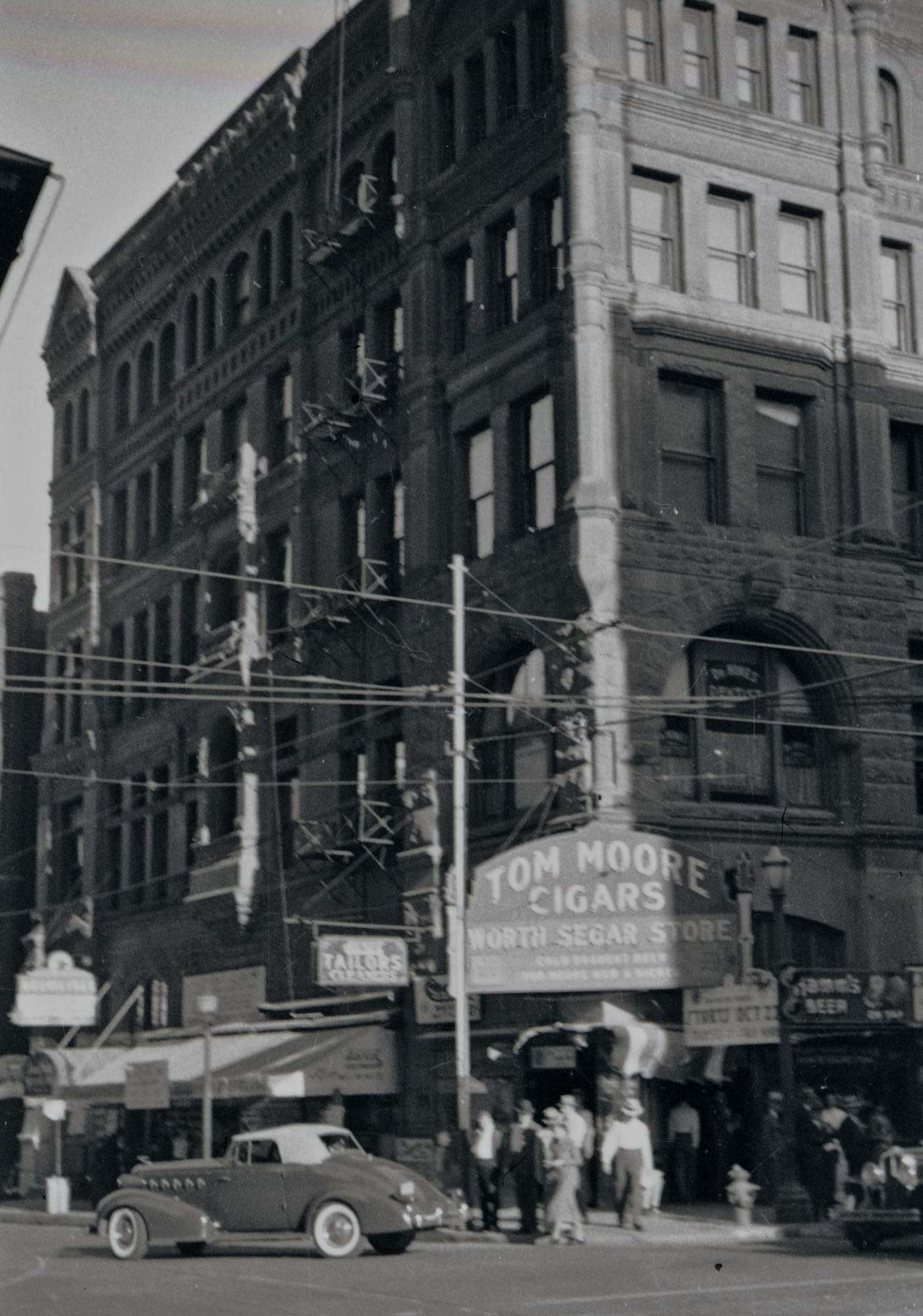 Tom Moore Cigar's storefront in Fort Worth, Texas, 1930s.