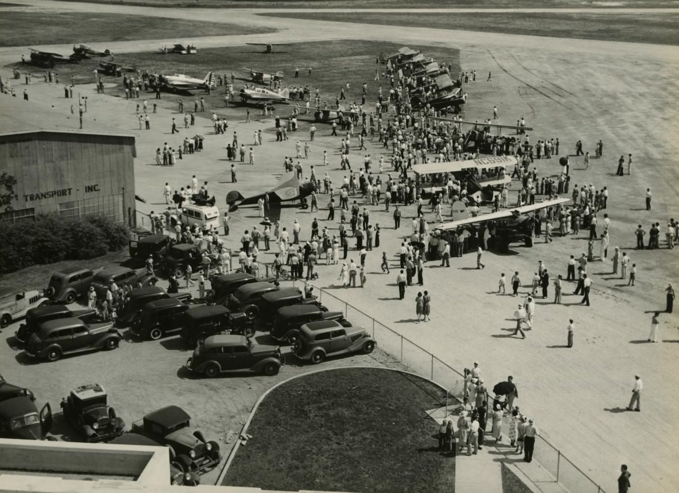Spectators watching parked planes at an airshow in Fort Worth, Texas, 1937.