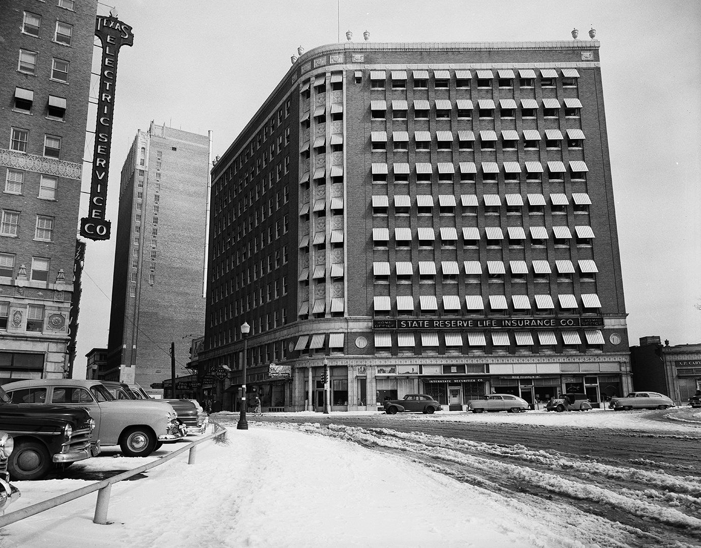 Image shows the Neil P. Anderson Building at 7th and Lamar, offices of the State Reserve Life Insurance, 1951.
