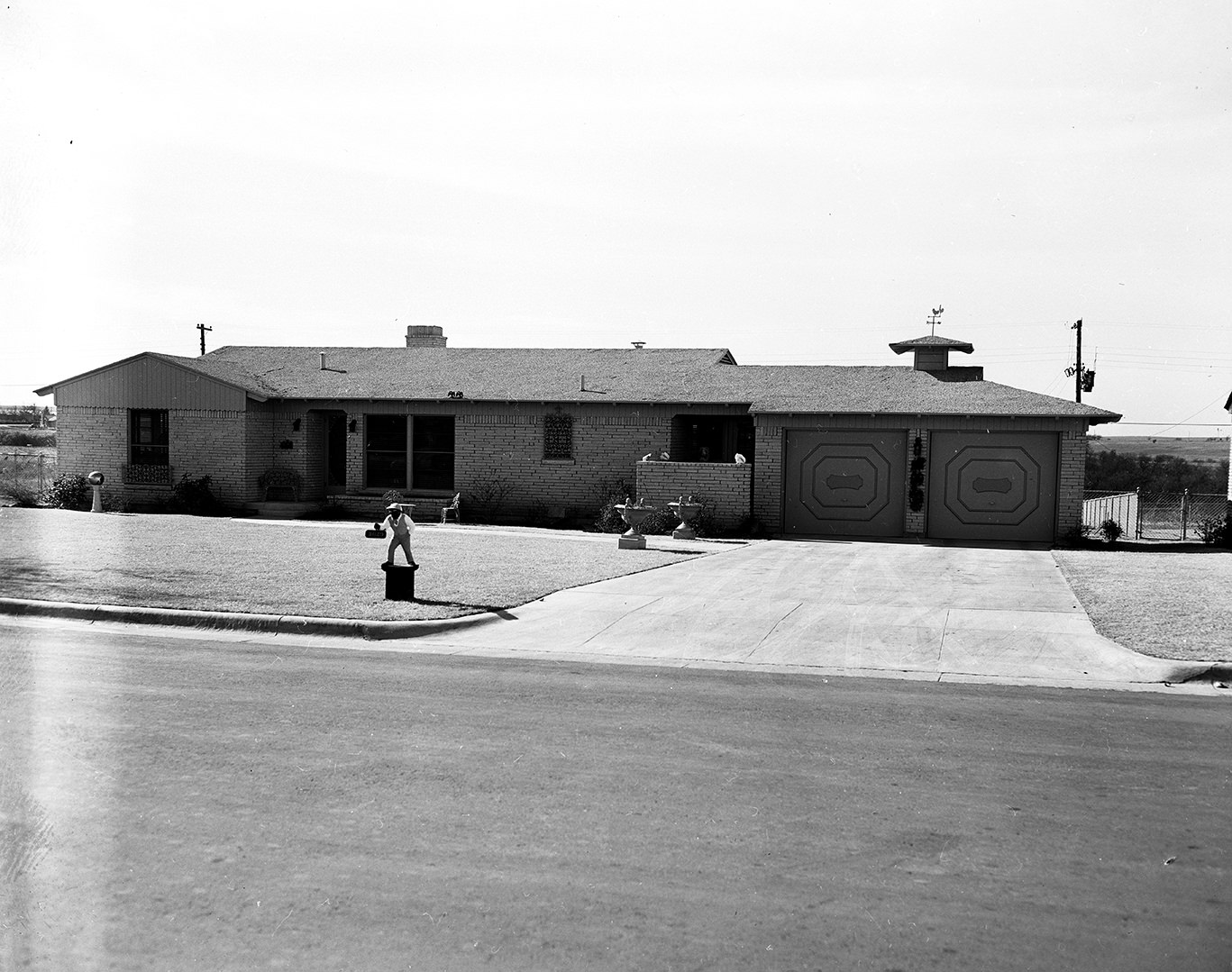 The Dowlin house, pink and green smith stone home at 3629 Manderley, 1951.