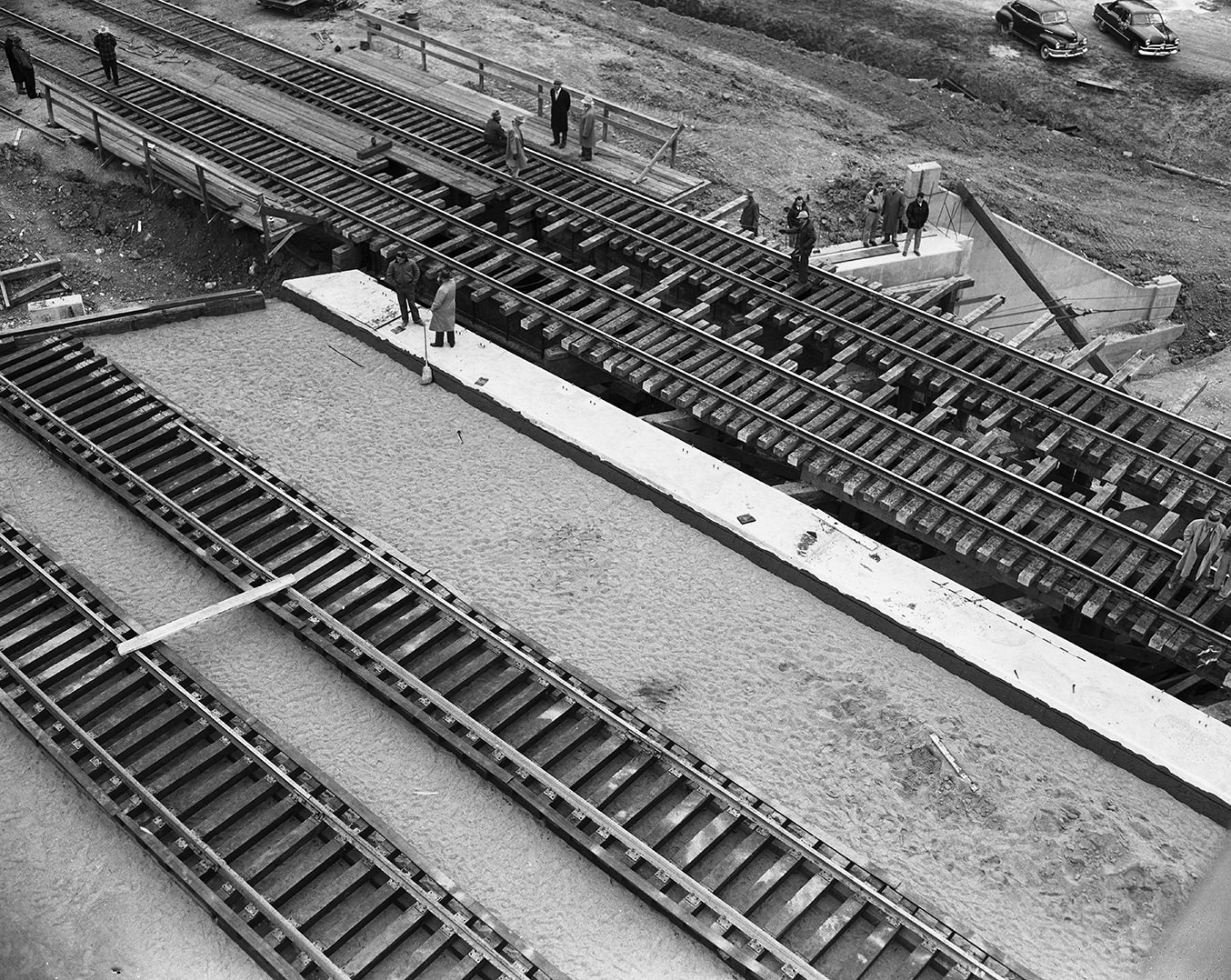 New steel platform being skidded under the Texas & Pacific Railway tracks in Trinity Park, 1950.