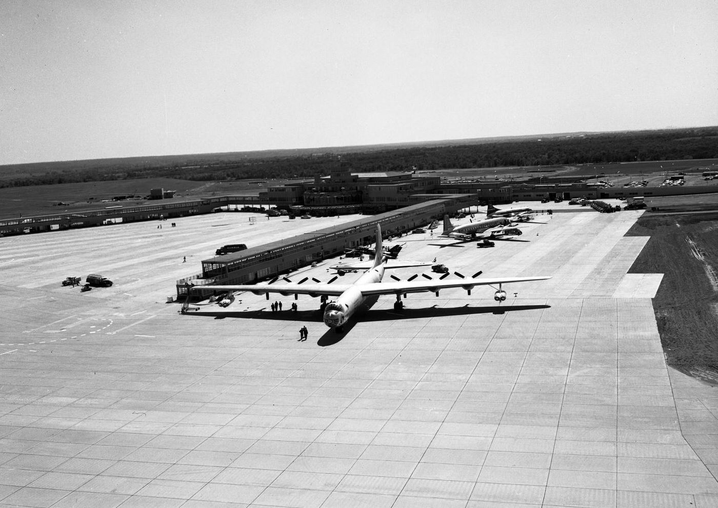 Three airplanes on a ramp at Greater Southwest Airport (Amon Carter Field), 1953.