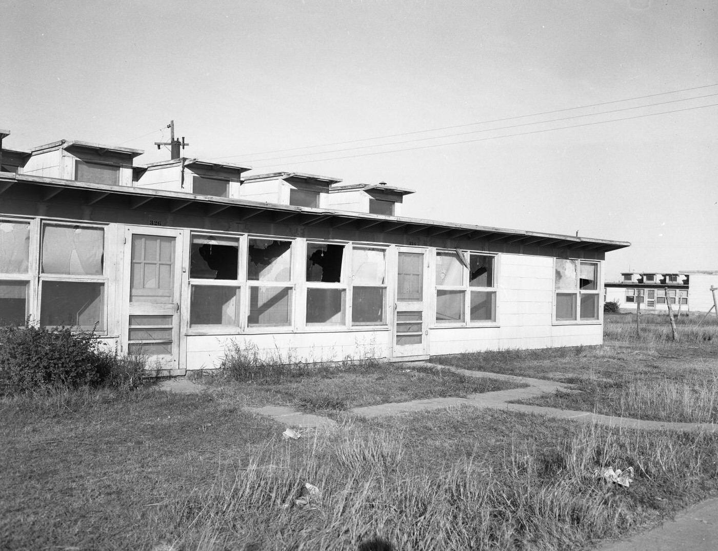 Old homes in Fort Worth slated for demolition to build Liberator Village, 1953.