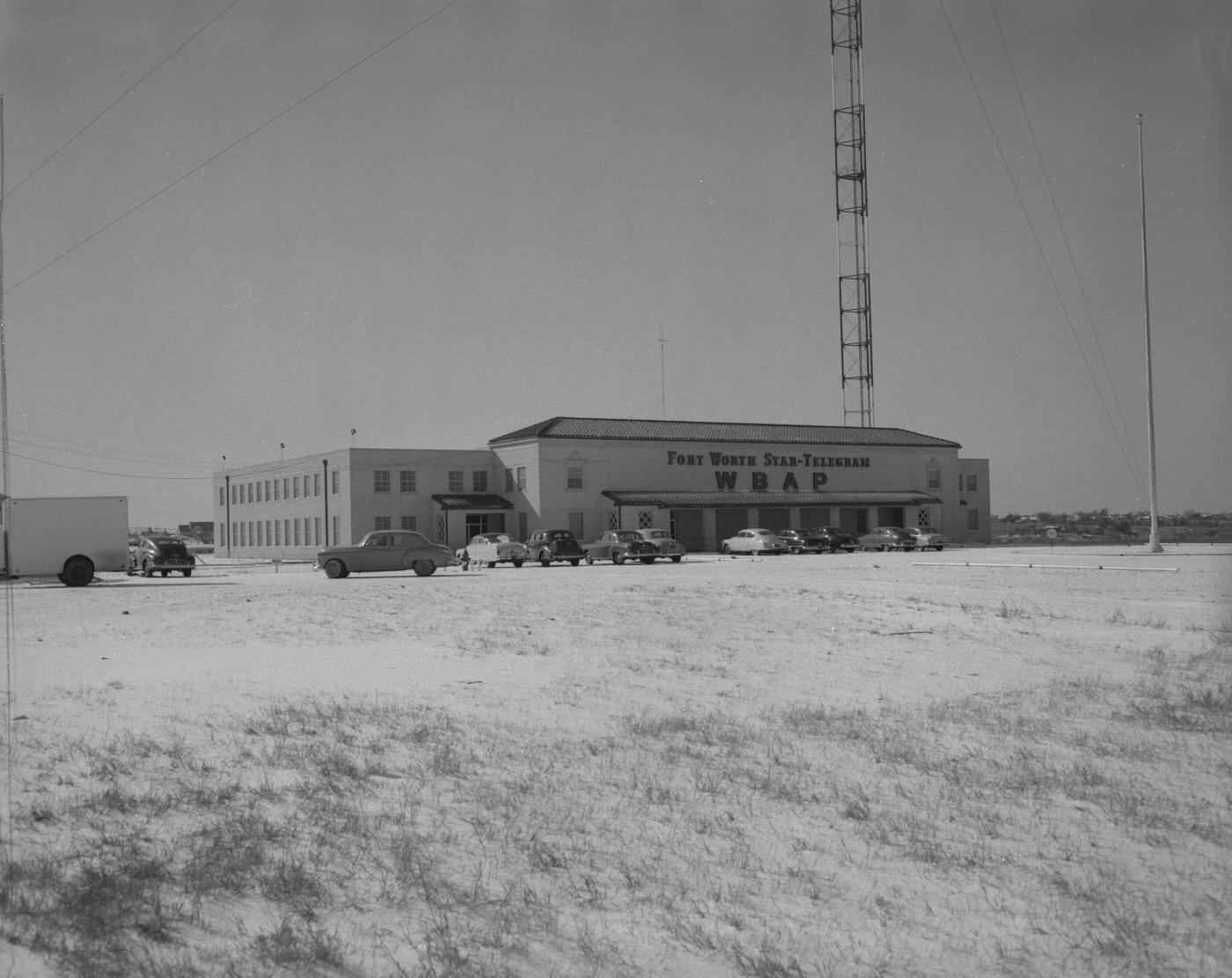 The Fort Worth Star-Telegram station, viewed across a snowy field, 1951.