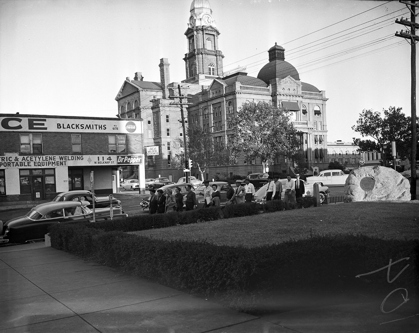 The jury hearing the trial of Mrs. Mary Clark returning to the Criminal District Court Building after a lunch break, 1955.
