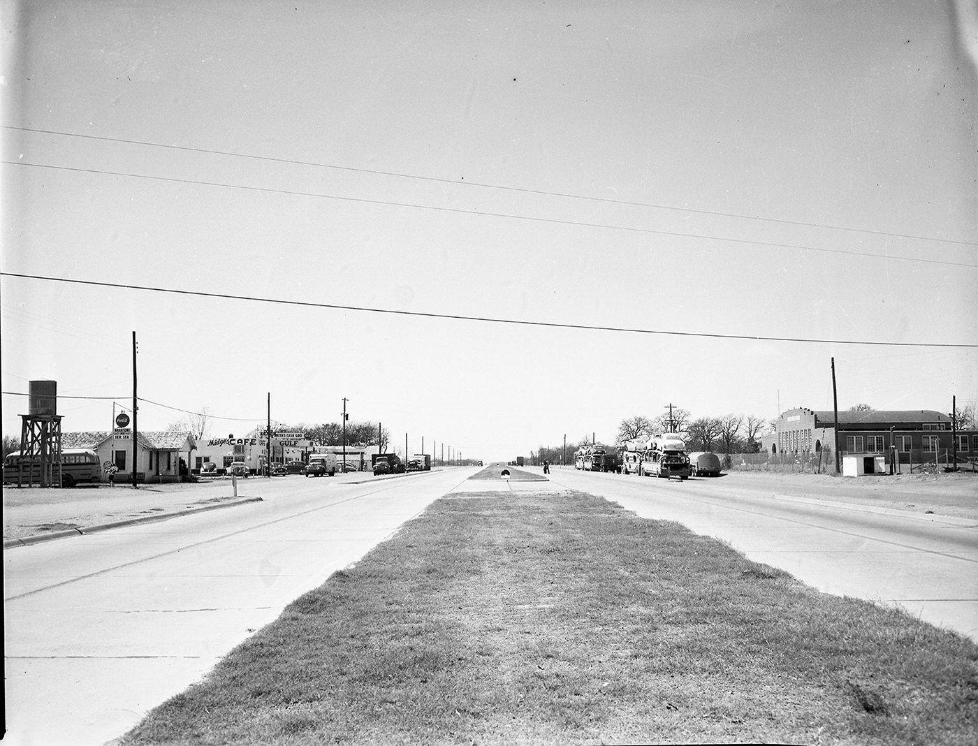 A street scene looking west on State Highway 183, 1951.