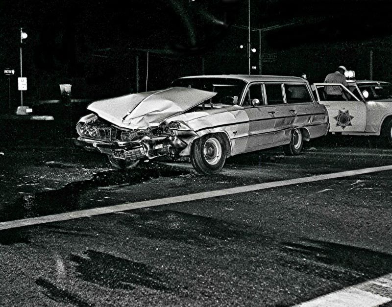 A 1964 Chevrolet wagon sold new by Frontier Chevrolet gets "customized" in an evening accident in Fresno, California, in the mid-1960s, The mis-matched color of the front end suggests this wagon had already been in wreck prior to his event