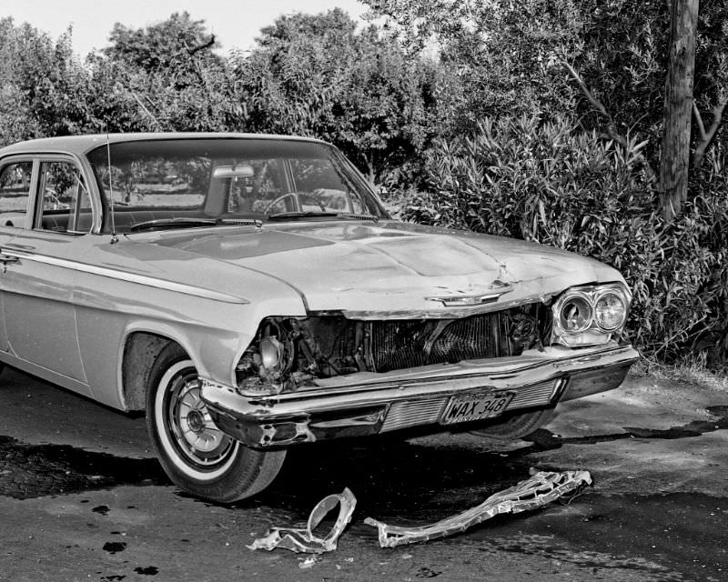 A 1962 Chevrolet (near new at the time) pulled out from a near blind side street and got hit by a 1956 Plymouth at Minnewauwa and Washington, Fresno, May 1962