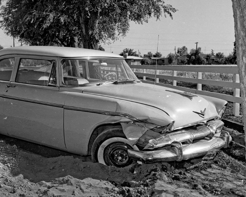 This 1956 Plymouth had the right of way and hit an emerging 1962 Chevrolet at Minnewauwa and Washington, Fresno, May 1962