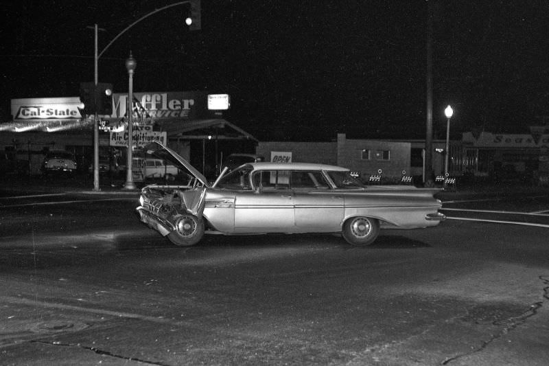 A 1959 Chevrolet, evening accident at the intersection of Olive and Blackstone in Fresno, California, about 1964