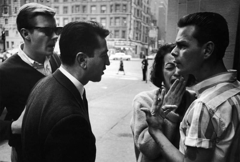 A plainclothes policeman (L) stops a couple known to be drug users for a search. Karen (2R) begins loud crying which tends to make cops uneasy.