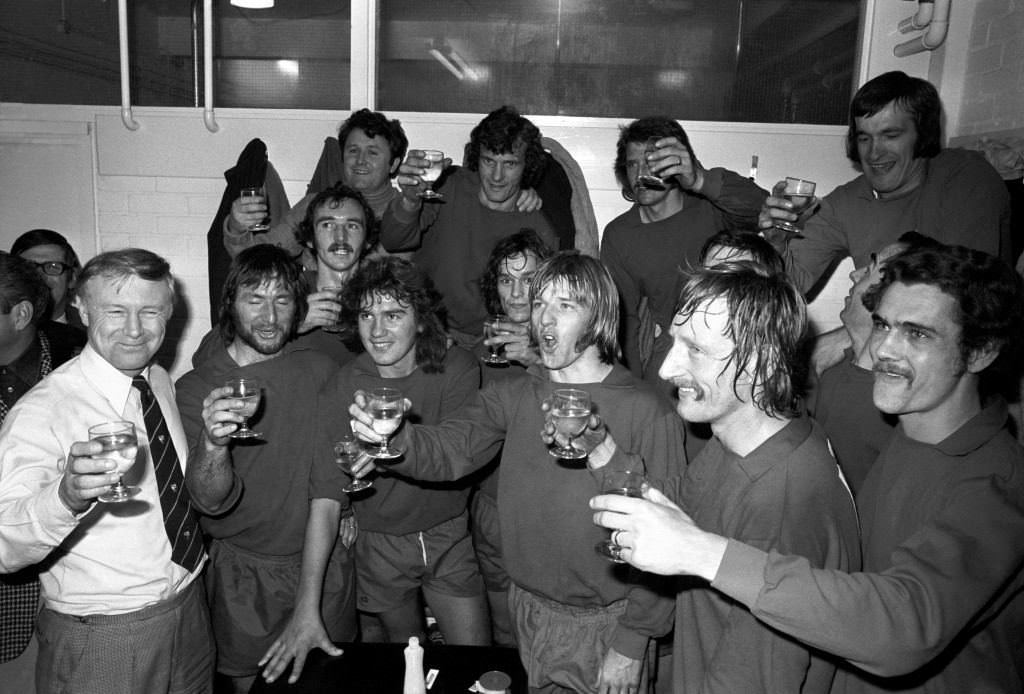 Liverpool's Chris Lawler, Ian Callaghan, and Tommy Smith celebrating, 1973.