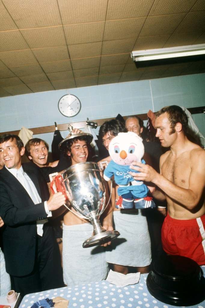 Hereford United players celebrating victory in the dressing room, 1972.