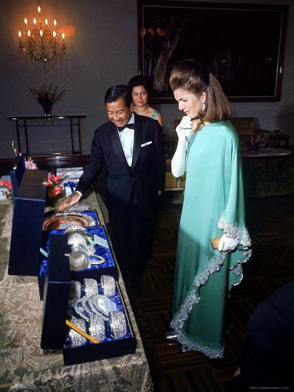 Cambodian Prince Sihanouk and Wife Presenting Jacqueline Kennedy silverware on trip to Cambodia. Nov 1967