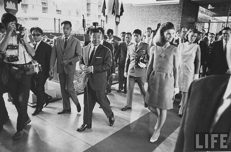 Jackie Kennedy walking with Prince Norodom Sihanouk during her visit to Cambodia. Nov 1967