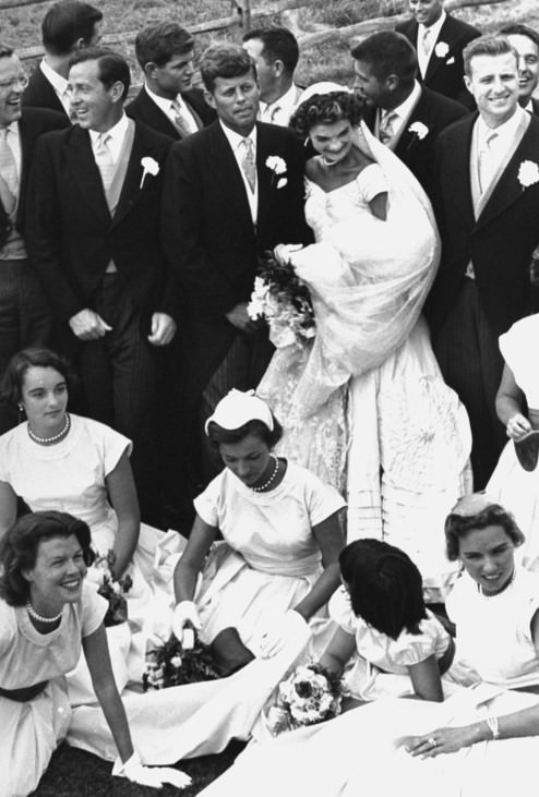 Senator John Kennedy and his bride Jacqueline with ushers, bridesmaids, and flower girls at their wedding, 1953.