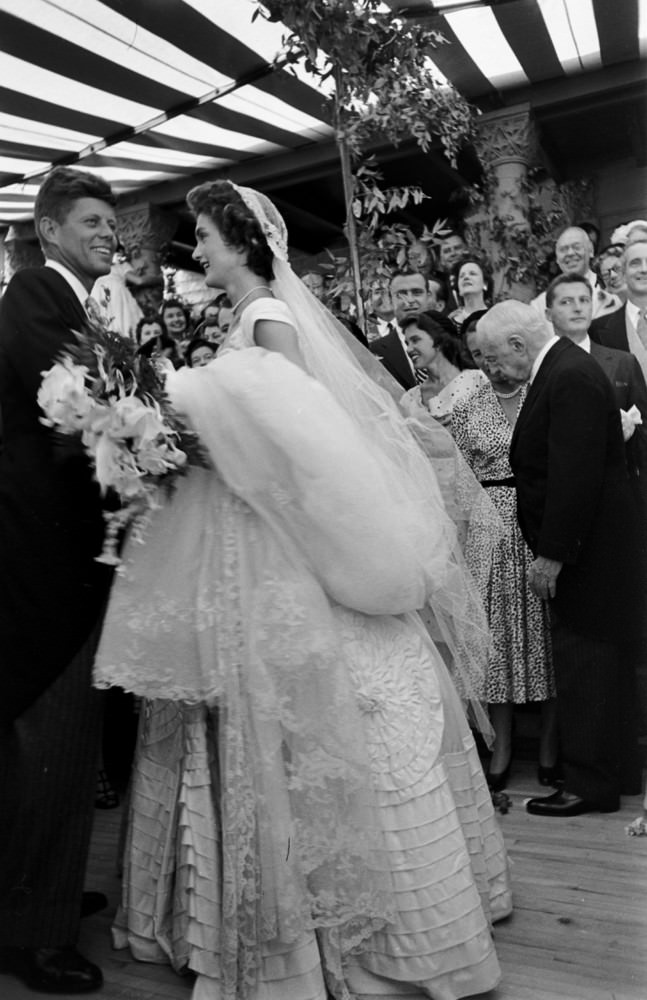 John F. Kennedy and Jacqueline Kennedy share their first dance at their wedding reception, Newport, Rhode Island, 1953.