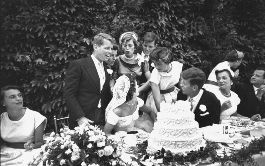 Senator John F. Kennedy and his bride Jacqueline at their wedding reception, 1953.