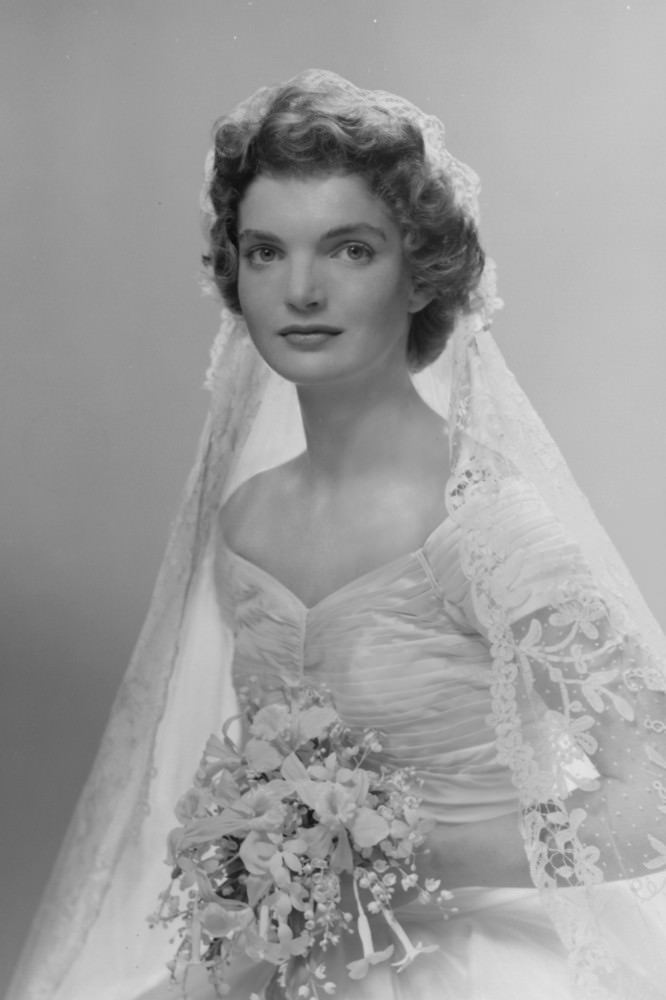 Bridal portrait of Jacqueline Lee Bouvier in her wedding dress, New York, 1953.