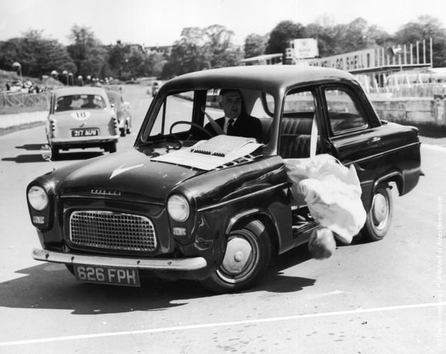 A road safety demonstration showing the dangers of not wearing a seatbelt at the Crystal Palace, London, 1964.