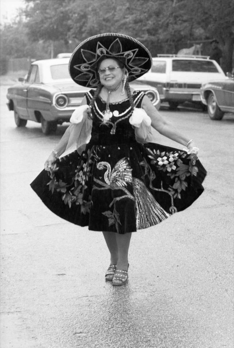 A woman in traditional Mexican attire participates in the Mexican Independence Day parade in Fort Worth, Texas, 1974.