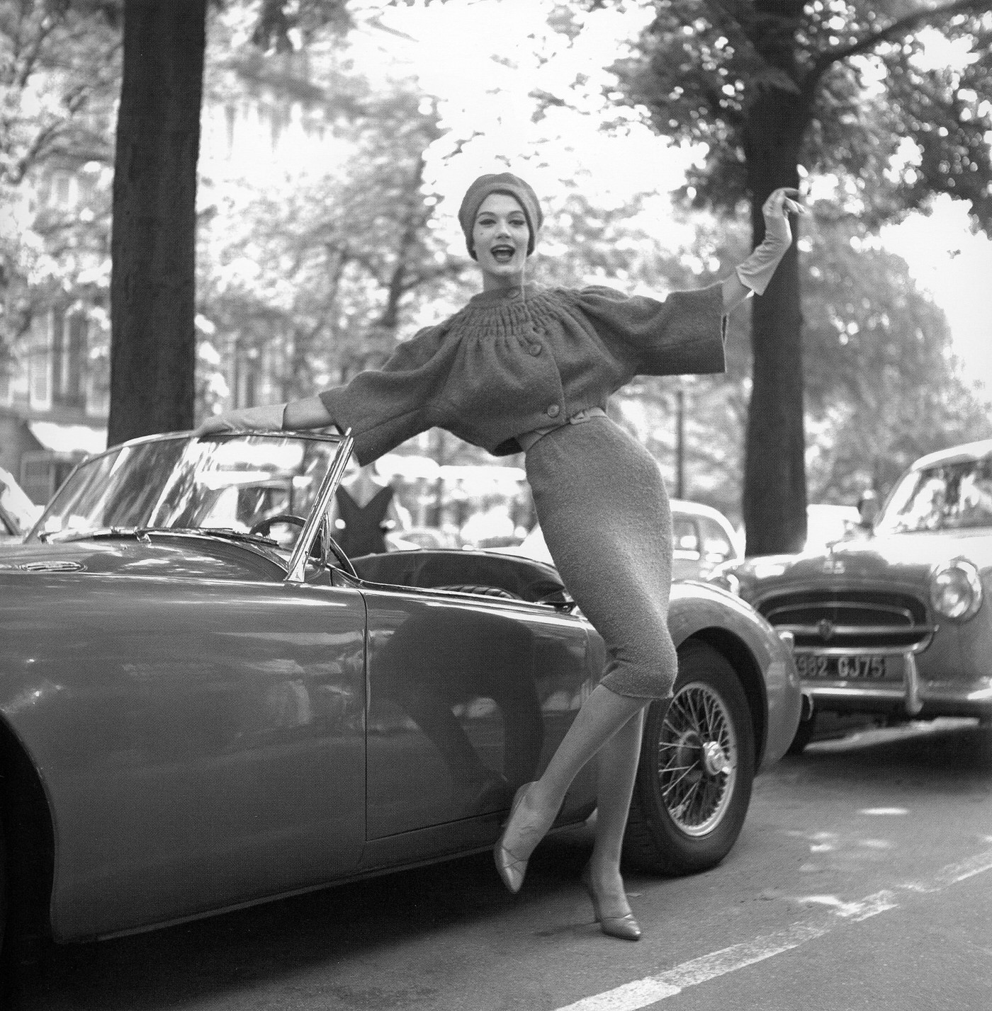Simone d'Aillencourt and the MG, photo by Georges Dambier, Paris, ELLE, 1957