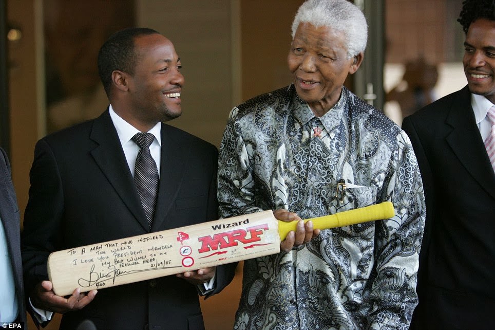 West Indian cricket star, Brian Lara (L) meetings with Nobel Peace Prize winner and iconic political prisoner Nelson Mandela (R) at the Nelson Mandela Foundation, Johannesburg, South Africa in 2005.