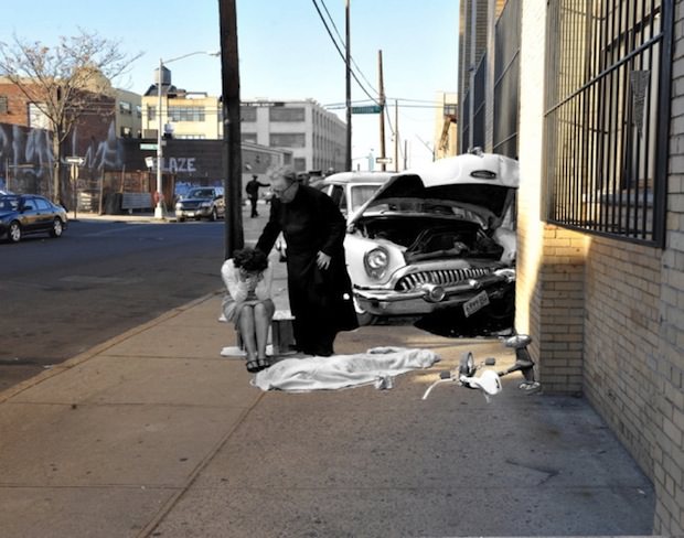 The aftermath of a car wreck that took the life of three-year-old Martha Cartagena, who was riding her tricycle when she was struck and killed on Porter Ave. in Brooklyn on April 4th, 1959.