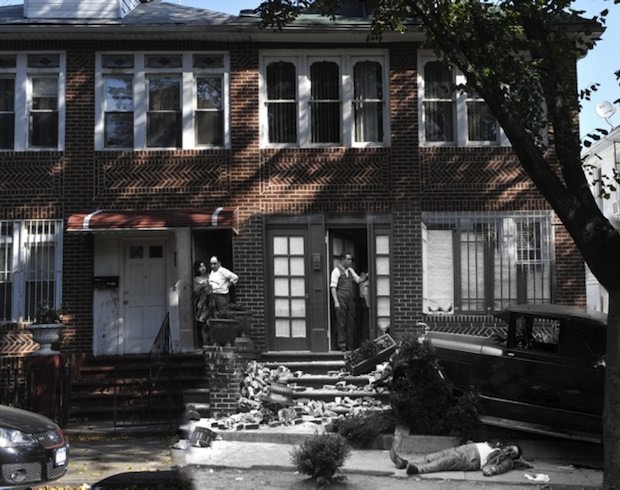 This photo shows the death of gangster Frankie Yale, whose car slammed into the steps of a Brooklyn home after he was shot from an adjacent car on July 1st, 1928.