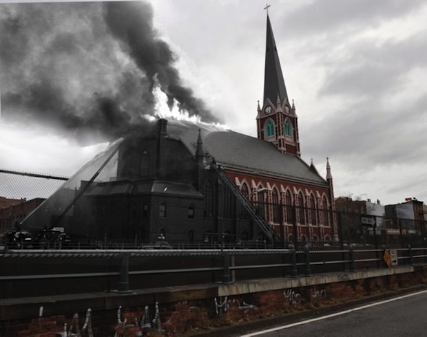 Firefighters try to put out the fire that tore through the Sacred Hearts of Jesus and Mary & St. Stephen Roman Catholic Church in January of 1951.