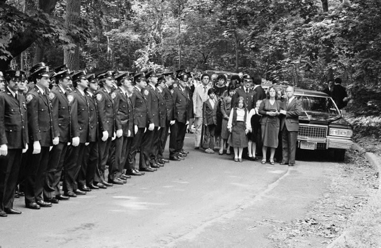 The funeral of a police officer who was killed on duty, 1979.