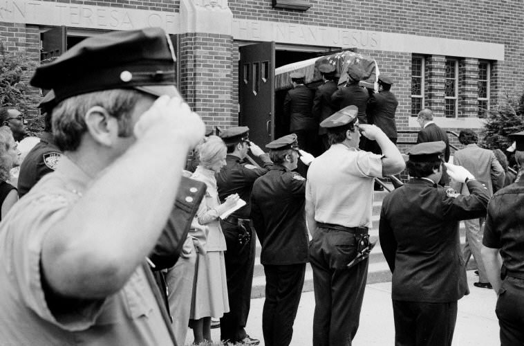 The funeral of a police officer who was killed on duty, 1979.