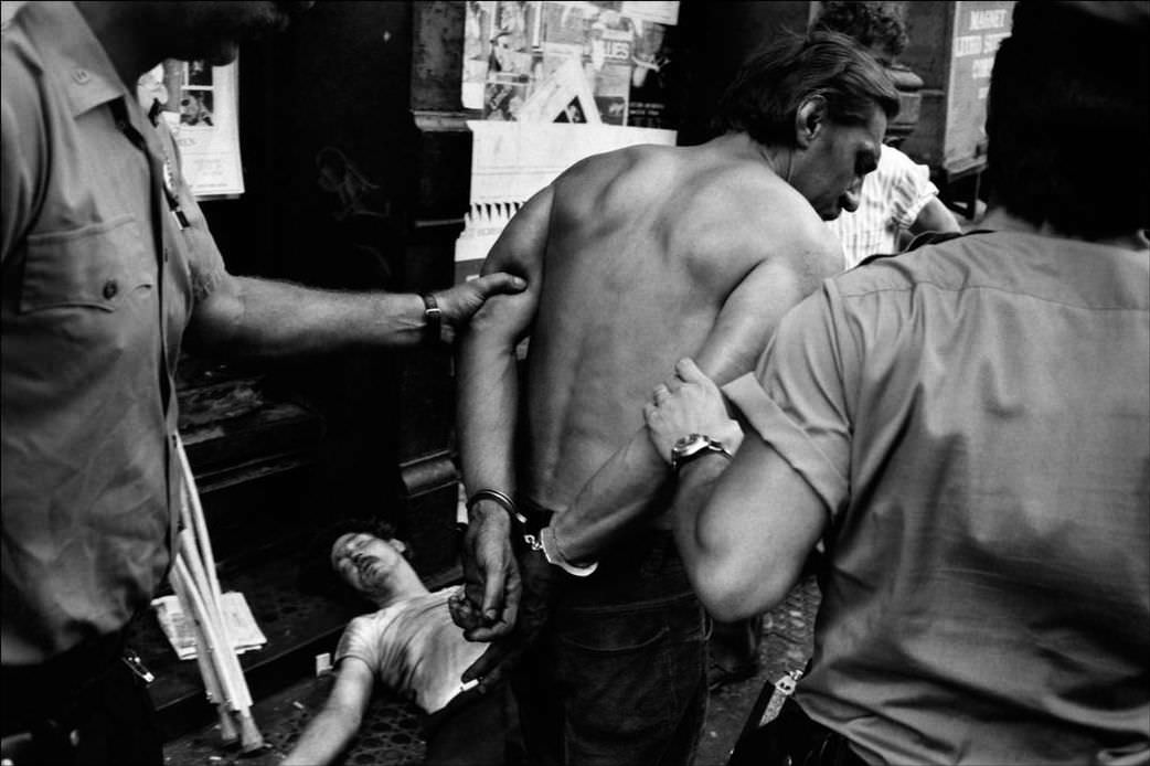 The Bowery in the Lower East Side is full of drug addicts, alcoholics, and drug dealers; police make regular rounds, 1978.