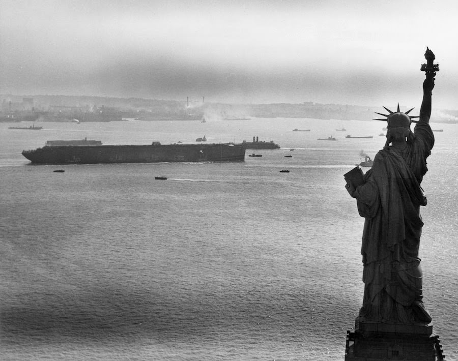 The Statue of Liberty and the U.S.S. Lafayette, 1945.