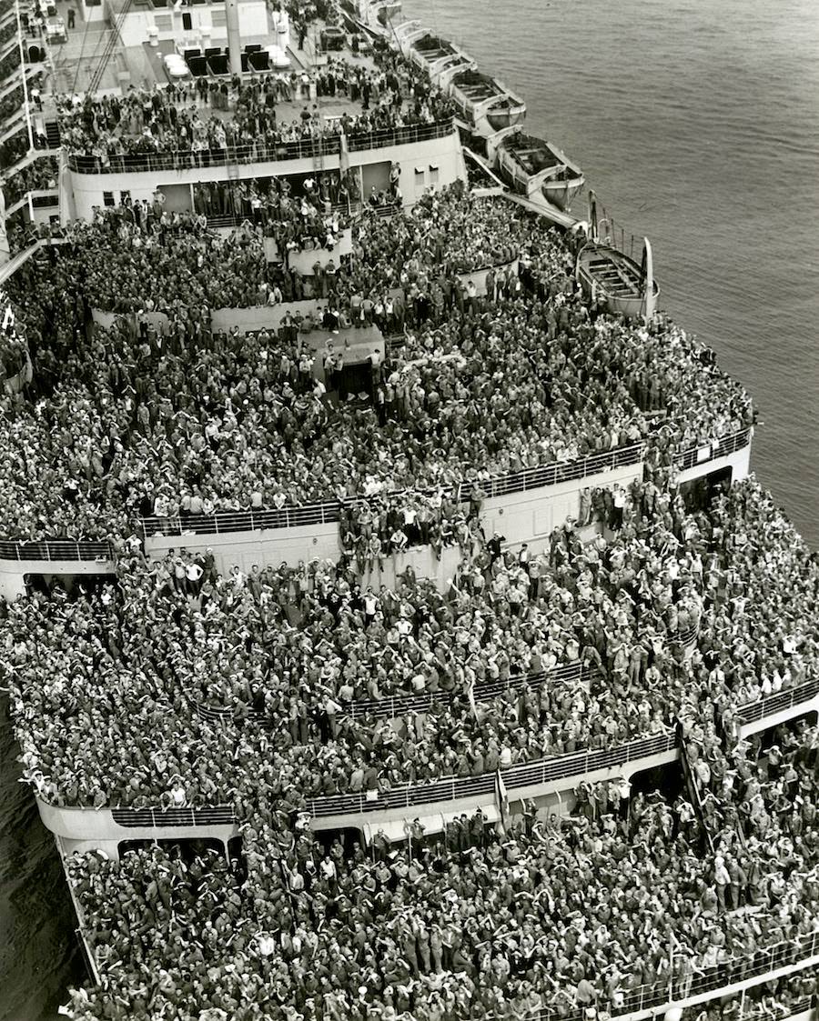 Crowded ships brought American troops back to New York Harbor for months after V-Day.